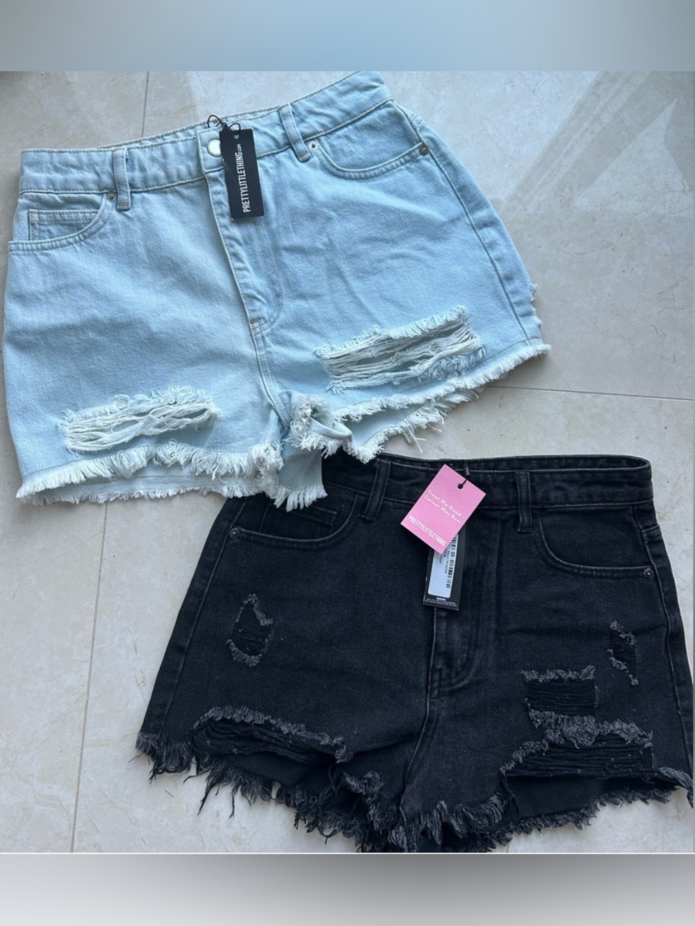 Pretty little things denim shorts X2! Black and light blue size 6. Both NWTs!